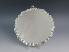 A George V silver salver, maker Hawksworth, Eyre & Co, Sheffield, 1928, of circular form with
