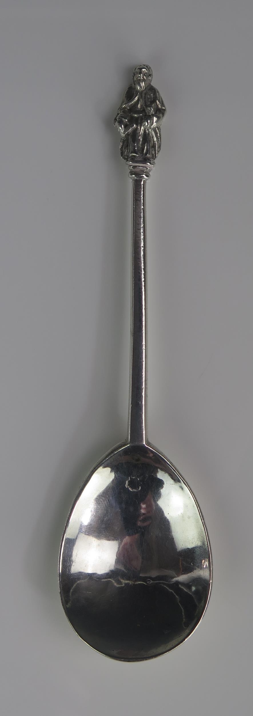 A silver apostle spoon, marks worn and illegible, 127.5cm long.