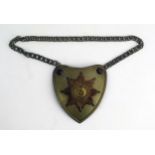 A Third Reich period S.A. standard bearers gorget, of shield-shaped outline, with central National