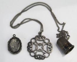 A Scottish Silver Pendant on chain, a silver locket and a silver thimble, 21.42g gross