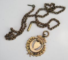 A 9ct Gold Fob (6.7g) and faceted yellow metal chain