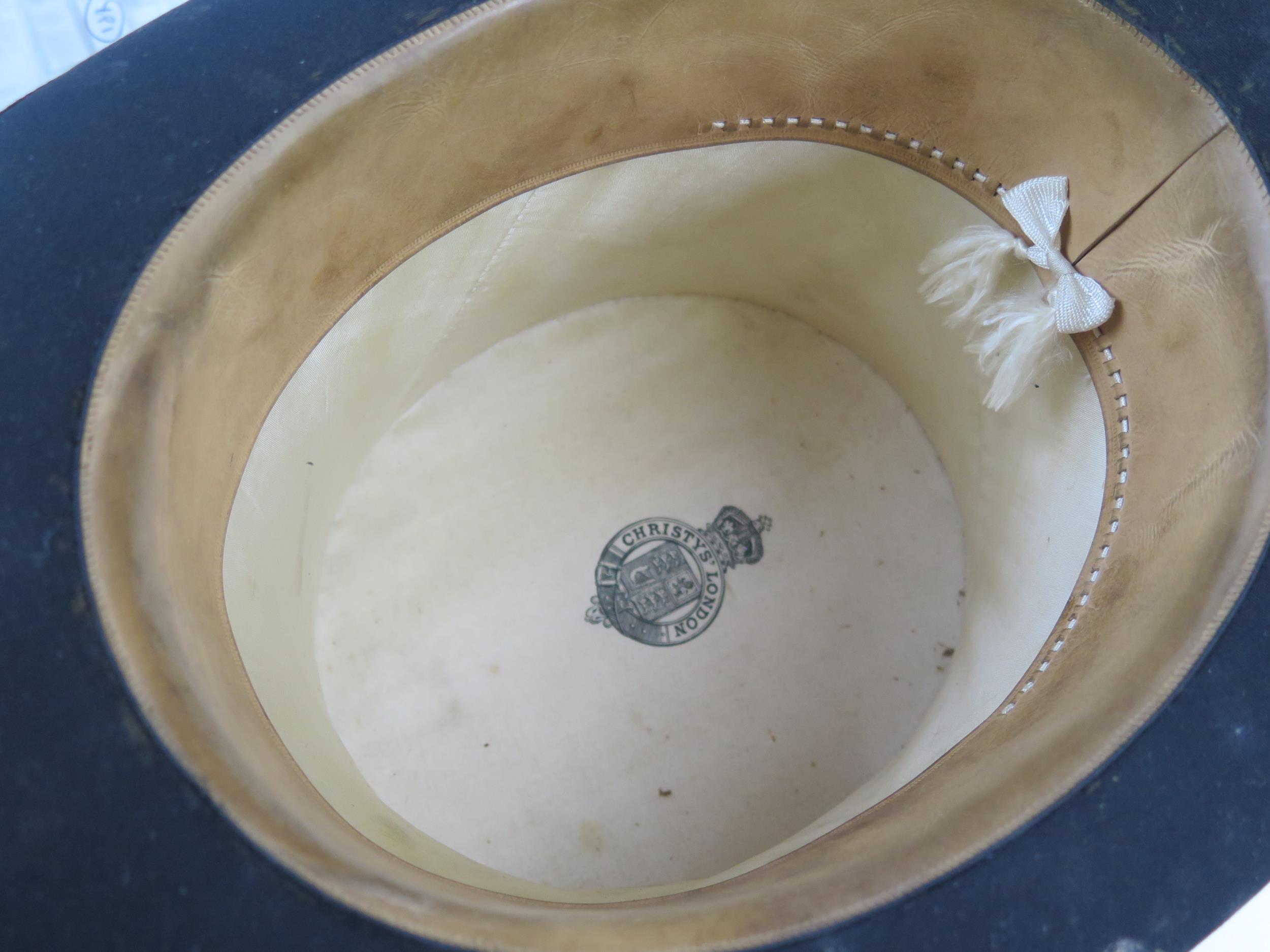 A Gents top hat by Christys' London, contained in a leather carrying case, together with a gent's - Image 2 of 2