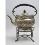 A late Victorian silver tea kettle and stand, maker Goldsmiths & Silversmiths Co Ltd, London,