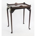 A Mahogany Occasional Table with a galleried top and a Georgian tilt top table