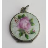An Enamel Locket decorated with a rose, 25.3mm diam.