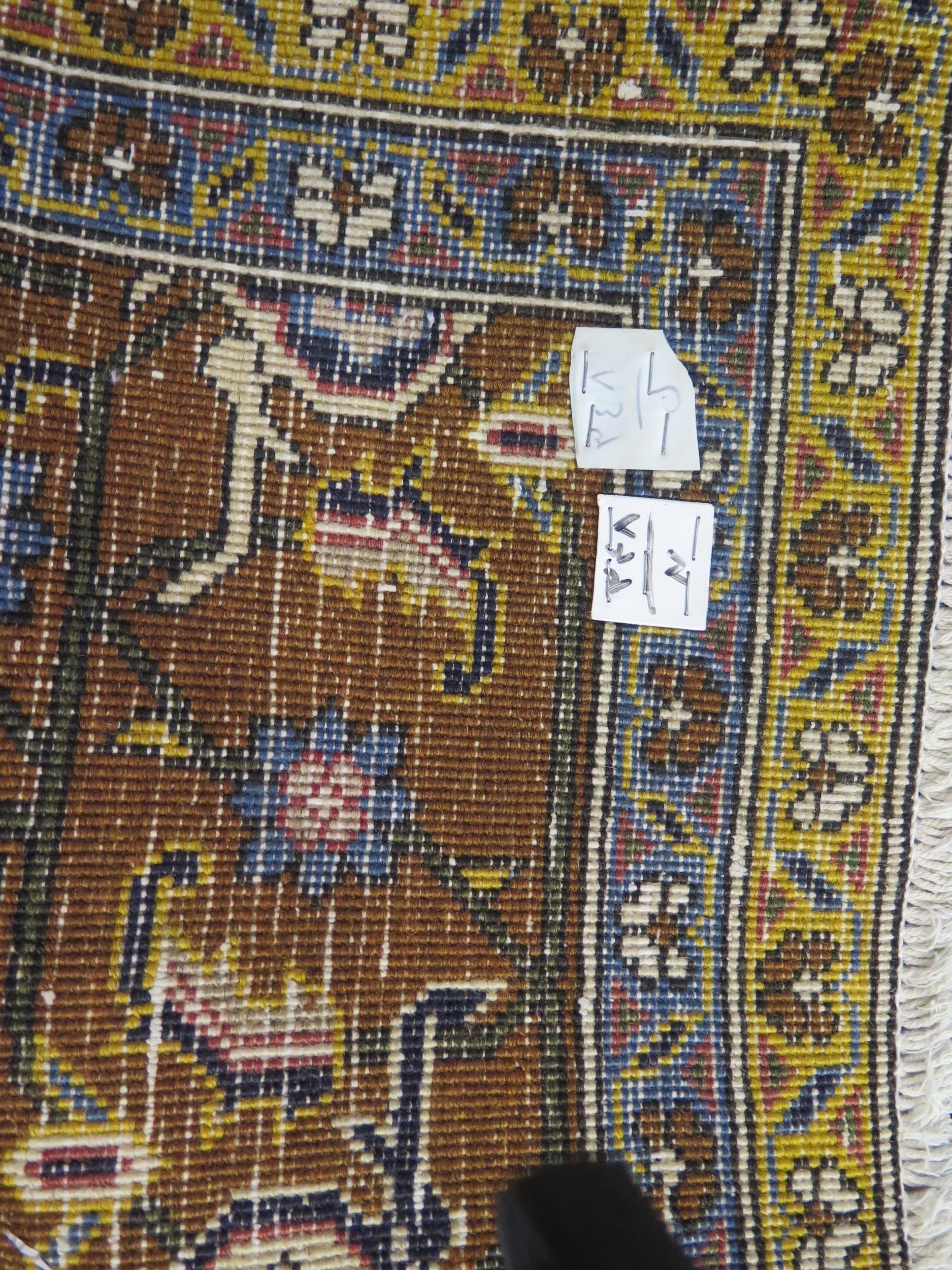 An Ardabil rug the wine red field with central powder blue medallion, enclosed by a multiple - Image 2 of 2