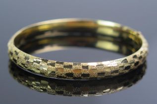 A Precious Yellow Metal Hinged Bangle, KEE tests as 14K, 11.25g. UNLESS OTHERWISE STATED, THE KEE