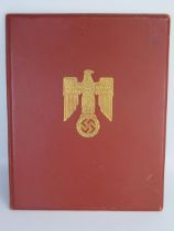 A scarce Third Reich Knights Cross of the Iron Cross presentation document on vellum to (
