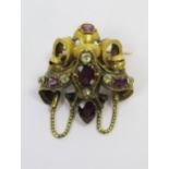 A Victorian Precious Yellow Metal and Stone Set Brooch with chased scrolling decoration, c. 51.2mm