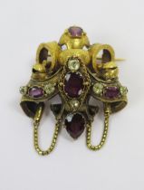 A Victorian Precious Yellow Metal and Stone Set Brooch with chased scrolling decoration, c. 51.2mm