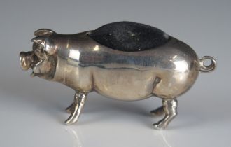 A white metal novelty pin cushion in the form of a pig, unmarked, 5cm long, gross weight 21gms, 0.