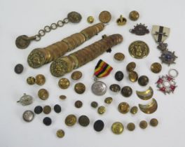 A collection of medals and regimental buttons, includes Polish Silver Cross for Merits, Belgium