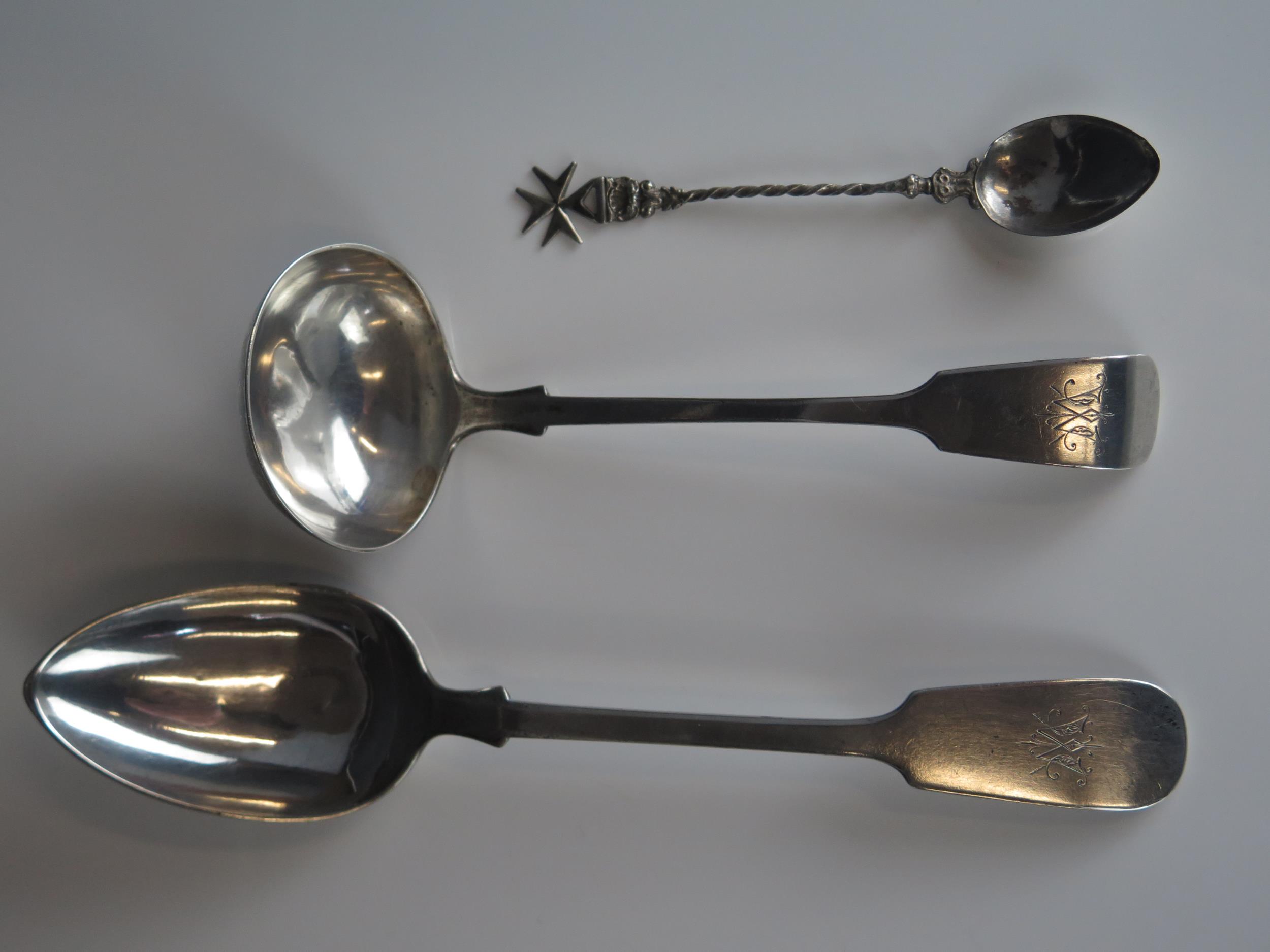 A German silver sauce ladle, and matching tablespoon, stamped marks, together with a silver coffee