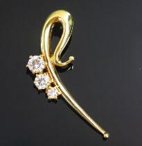 A Catherine Best 18ct Gold and Diamond Pendant, c. 37mm long, set with three brilliant cut stones (