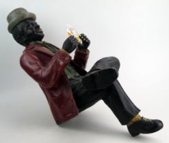 A Modern Model of a Card Player to be displayed on the edge of a ledge, c. 61ch high