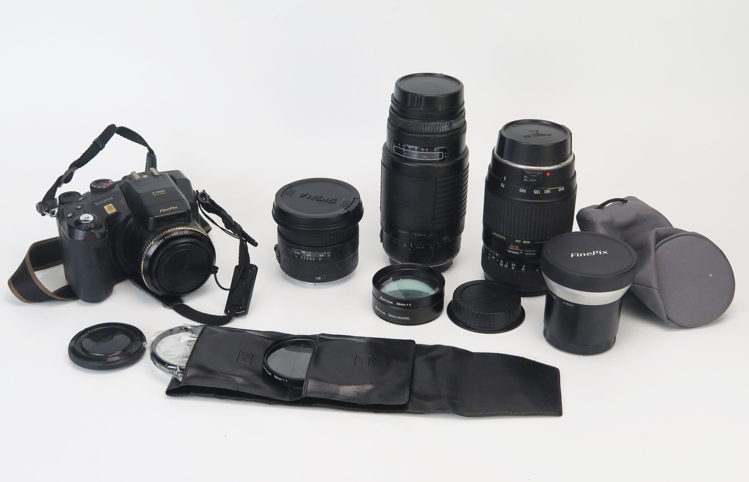 Collection of Camera Lenses including Sigma Auto Focus APO 75-300mm, Tamron AF 70-300mm, Sigma 18mm,