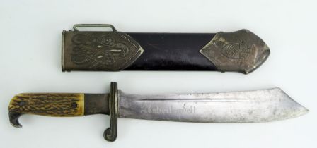 A Third Reich period RAD dagger with 24.5cm single edged, curved and fullered blade, with RAD