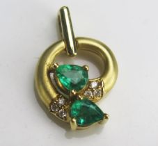 A Modern 18K Gold, Emerald and Diamond Pendant, 18.23mm drop, stamped 0.51 18K, 2.64g