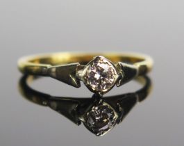 An 18ct Gold and Diamond Solitaire Engagement Ring, the c. 3.95mm brilliant round cut stone in a rub