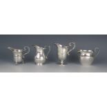 Four assorted silver cream jugs, various makers and dates, total weight of silver 292gms, 9.