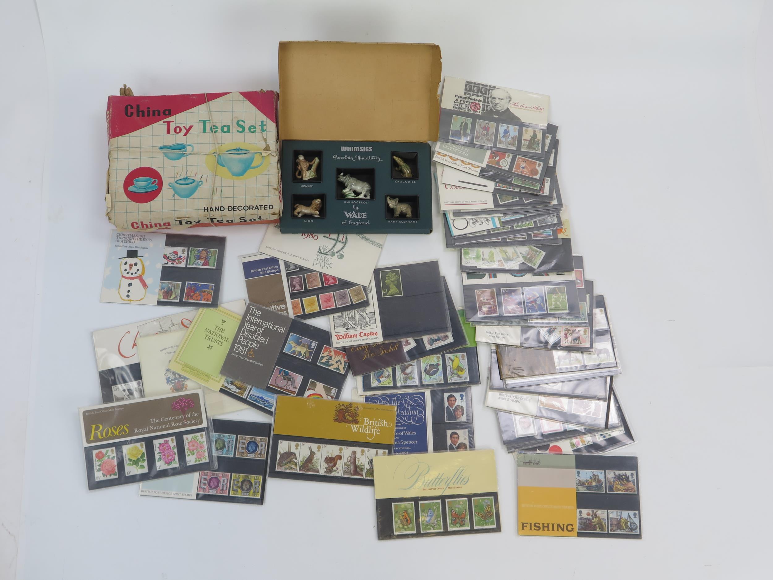 A Collection of Mint Stamp Packs, Wade Whimsies boxed set and a toy tea set