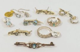 A pair of pale blue topaz half hoop earrings and a marching ring, and other blue topaz set jewellery