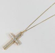 A 9 carat gold bi-colour cross pendant, on fine 9 carat gold chain, 45cm long, combined weight 3g