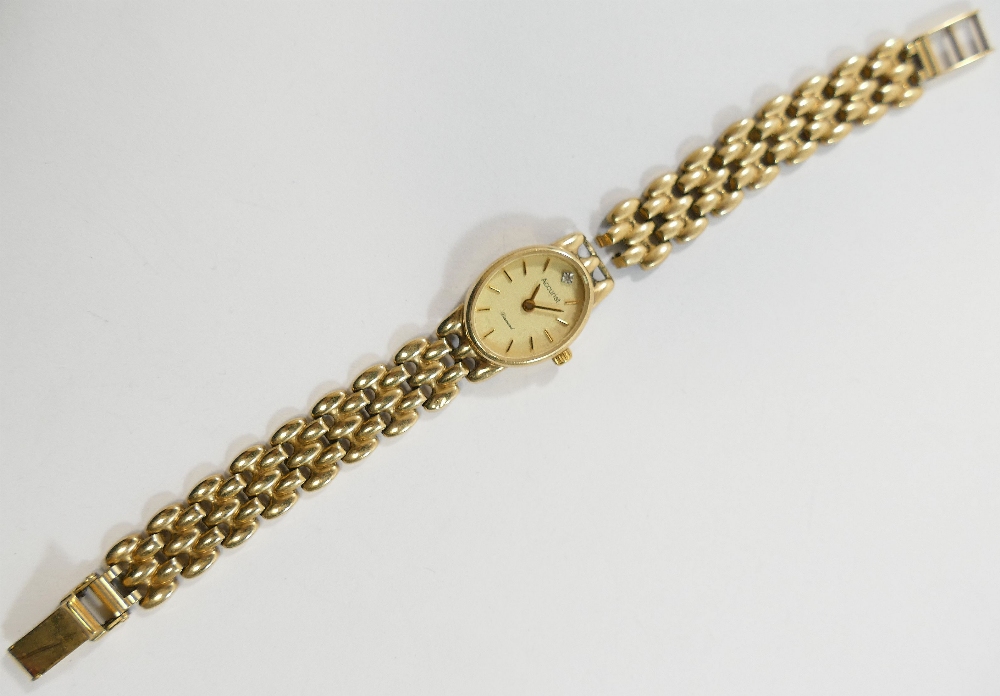 A 9 carat gold ladies Accurist bracelet watch, the oval face with baton markers and an eight-cut - Image 2 of 3