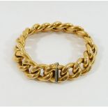 An Italian hollow curb link bracelet, of large proportions, the links with slightly flattened sides,
