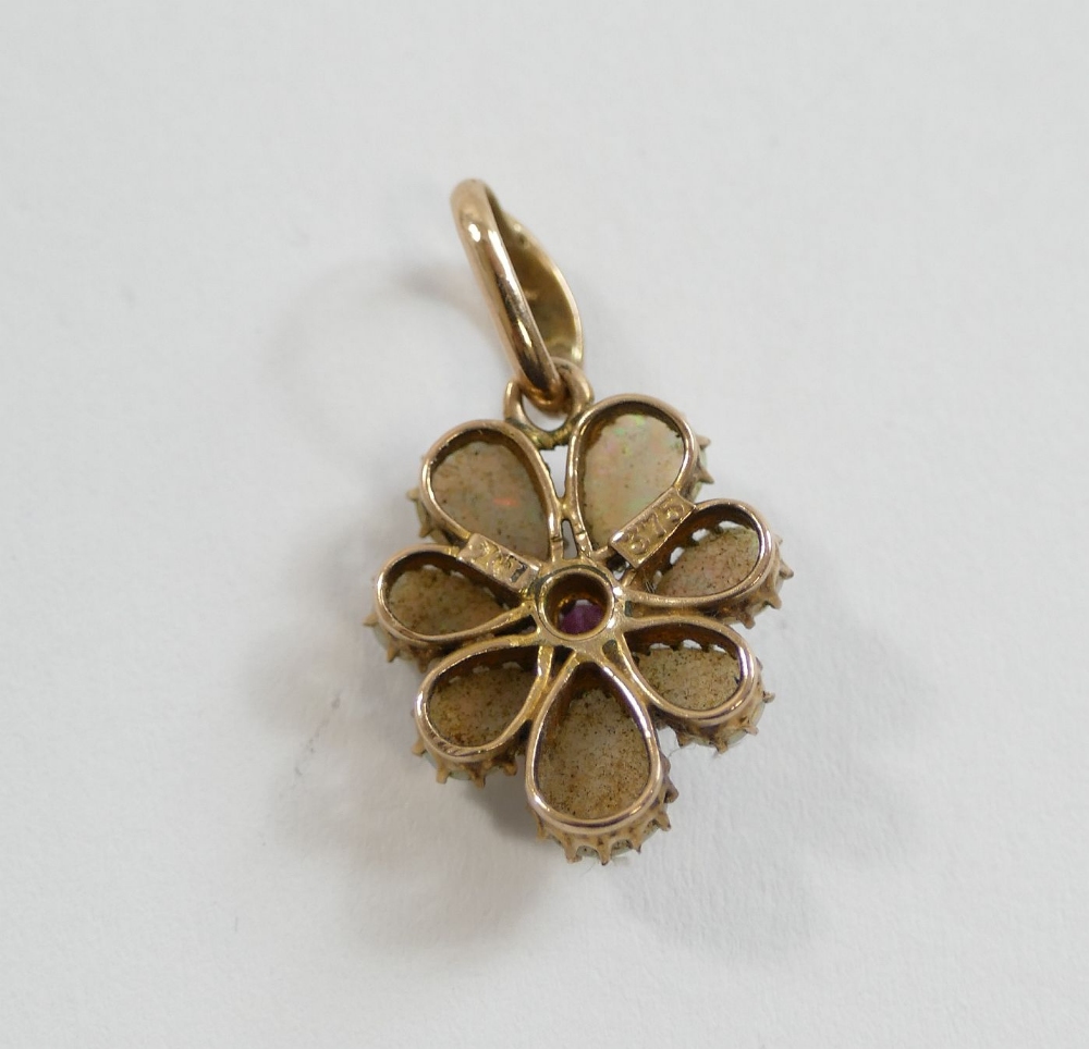 A late Victorian opal and garnet flower head pendant, the central eight-cut garnet within seven - Image 2 of 2