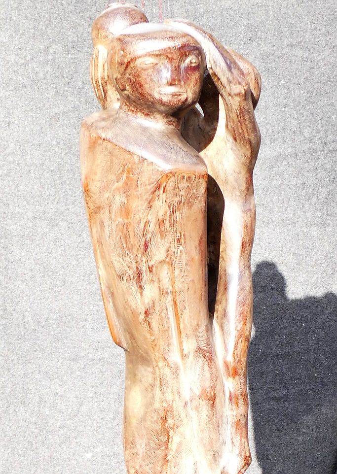 A large 20th century abstract wooden sculpture of a pregnant woman holding a child whilst standing - Image 3 of 3