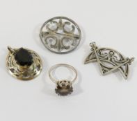Four items of Scottish silver jewellery comprised of a St. Magnus cross circular brooch by Malcolm