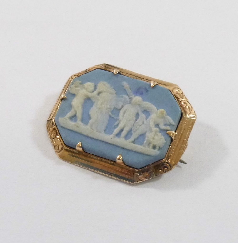 A 19th century yellow metal bar brooch set with split pearls, 3.7cm long, 3.4g gross, and a Wedgwood