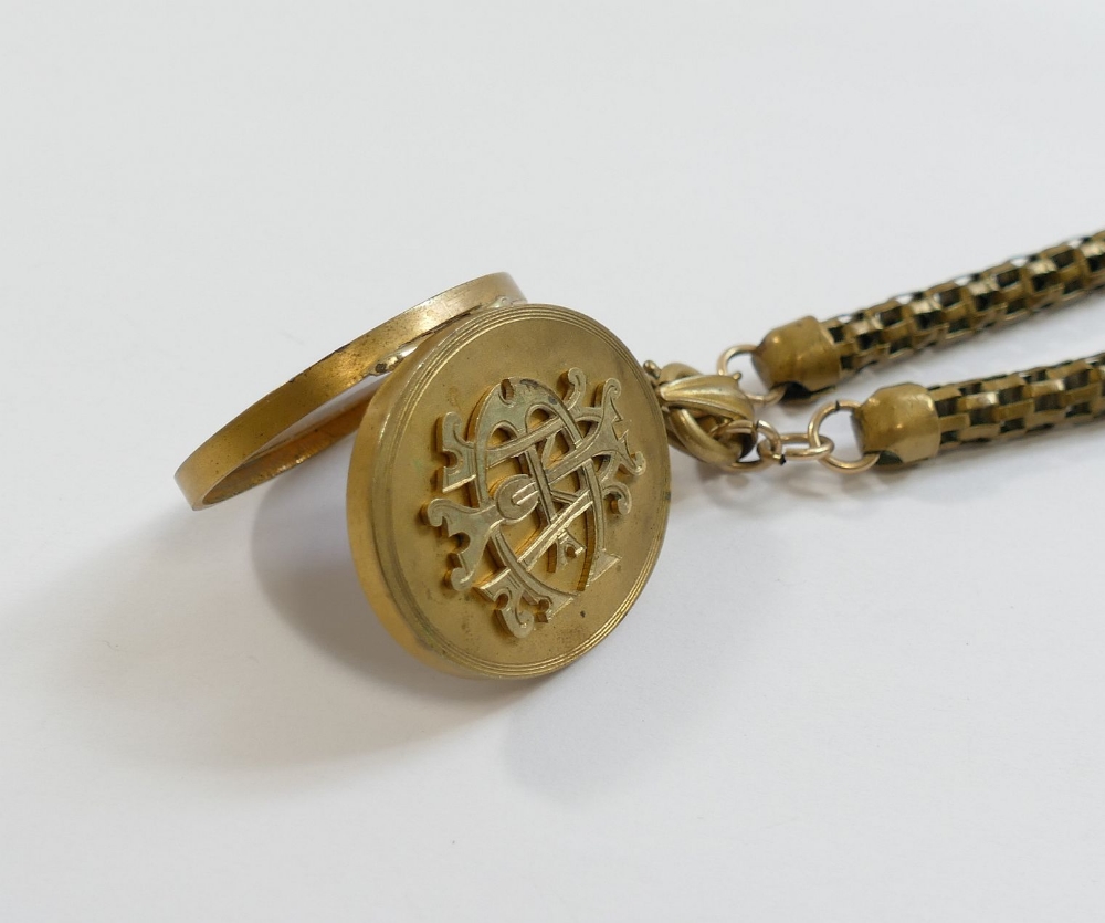 A Victorian oval gold plated locket with intertwined initials set in relief to the front, 3.3cm x - Image 5 of 9