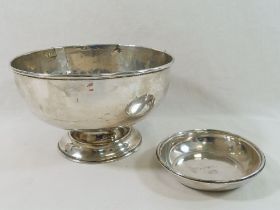 A silver pedestal bowl (at fault), and a small circular silver dish, combined weight 9.95ozt, 309.
