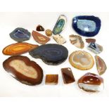 A selection of rock specimens, mainly banded agates, quartz crystals, gemstone ID cards and other