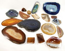 A selection of rock specimens, mainly banded agates, quartz crystals, gemstone ID cards and other