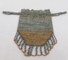 A 19th century cut steel beaded coin/sovereign purse, with drawer string top, 11.5cm long x 7.5cm