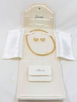 A French gold-plated collar necklace with accompanying half hoop earrings by Altesse CONDITION