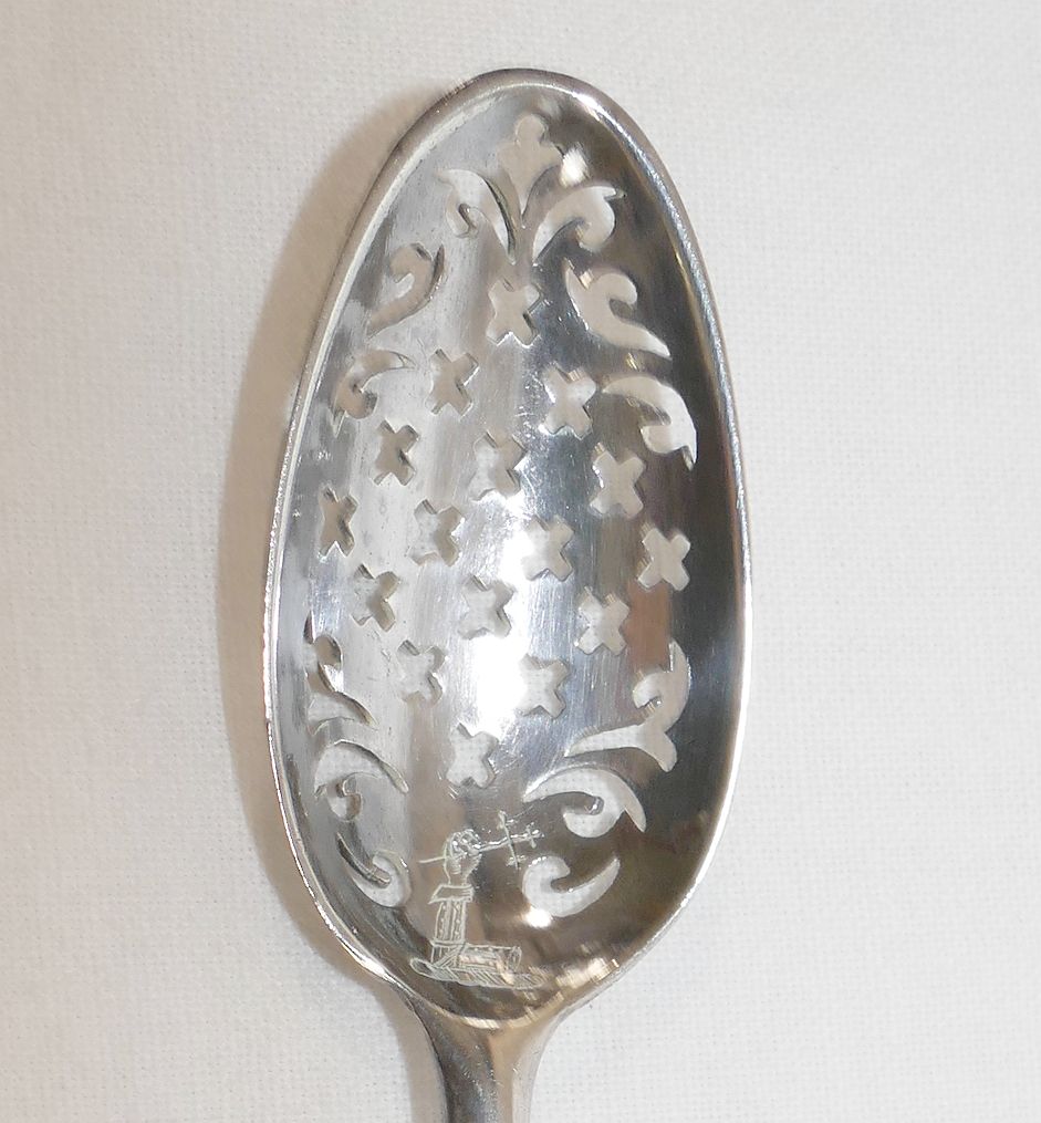 A Georgian silver mote spoon, engraved with the crest of an arm holding aloft a cross, possibly - Image 2 of 4