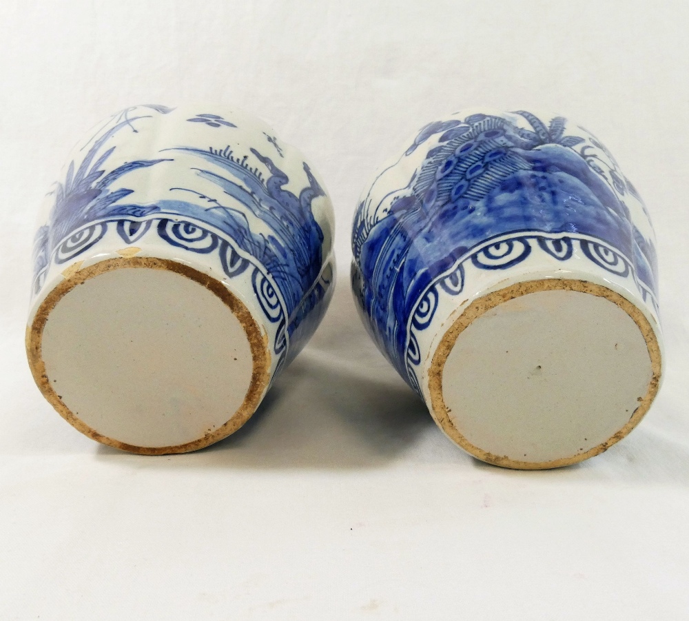 A pair of 18th century Dutch Delft lobed baluster vases, decorated with ducks and birds amongst - Image 2 of 3