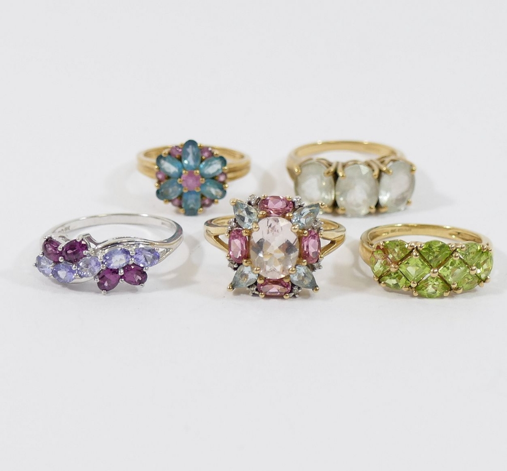 Three QVC 9 carat gold gem-set dress rings, and two other similar including a GTV example,