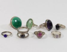 Eight single stone set rings, all stamped '925', including malachite, amethyst, garnet, onyx and