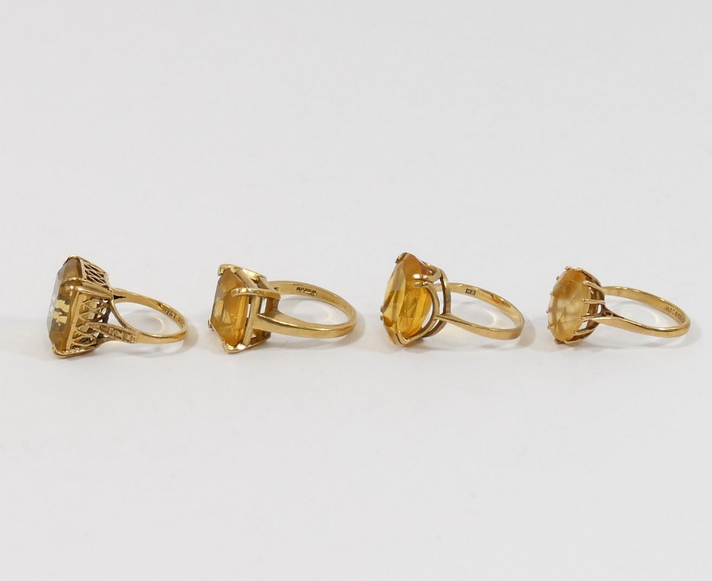 Six 9 carat gold single stone rings, set with smokey quartz and citrine, combined weight 24.6g gross - Image 3 of 5