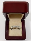 A diamond half eternity ring, the ten round brilliant cut stones each approximately 0.10 carats, set