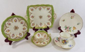 A 19th century John Mortlock Mintons porcelain tea cup, saucer and plate, hand painted with flower