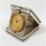 A 1930's small rectangular cased folding travel clock, Birmingham 1932, the case with engine