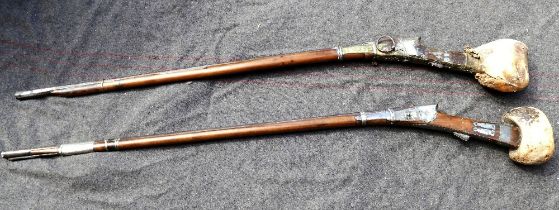 Two 19th century Indo-Arab matchlock rifles, possibly from the Yemen region, 142cm and 146cm long