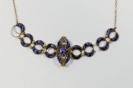 A Victorian marbled glass set necklace, the crescent moon shaped faceted stones in spectacle