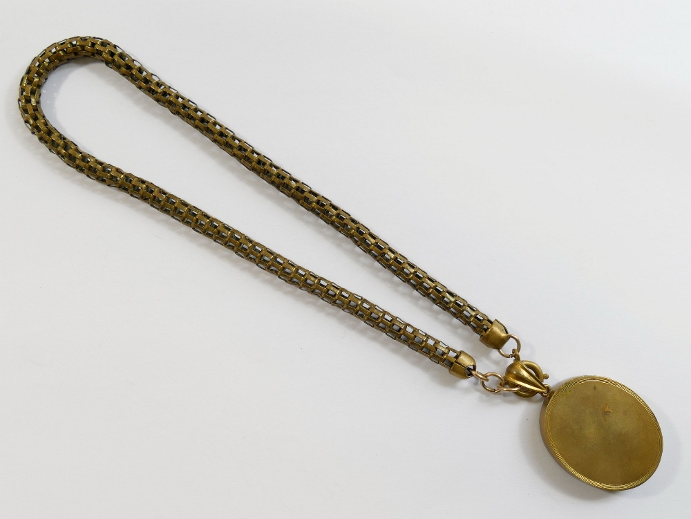 A Victorian oval gold plated locket with intertwined initials set in relief to the front, 3.3cm x - Image 3 of 9